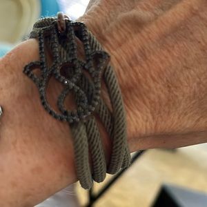 Hamsa embellished army green wrap bracelet. From Jerusalem